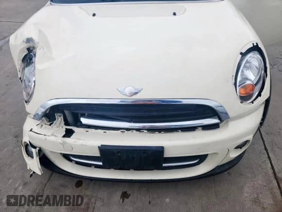 2013 MINI Hardtop with VIN WMWSU3C51DT678229, listed as a Copart auction lot 60745145 with 89,549 mi miles and Salvage title. Bid and sale history available at DreamBid. Image 11.