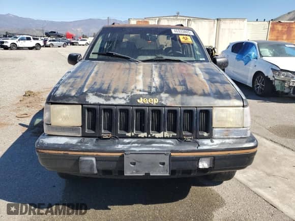 1993 Jeep Grand Cherokee Limited z VIN 1J4GZ78S3PC502345, wystawiony jako Copart lot #46933805 z przebiegiem 121 652 mil mil oraz Szkoda całkowita • Salvage title. Historia ofert i sprzedaży dostępna na DreamBid. Obrazek 5.