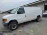 2003 Ford Econoline Cargo with VIN 1FTNE24W43HB61331, listed as a Copart auction lot 60618495 with 142,451 mi miles and Salvage title. Bid and sale history available at DreamBid. Image 1.