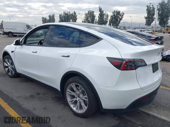 2023 Tesla Model Y Long Range with VIN 7SAYGAEE2PF763662, listed as a IAAI auction lot 43412618 with 43,857 mi miles and . Bid and sale history available at DreamBid. Image 3.