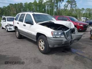 2002 Jeep Grand Cherokee Sport with VIN 1J4GW38S92C253513, listed as a IAAI auction lot 42470173 with 162,682 mi miles and . Bid and sale history available at DreamBid. Image 1.