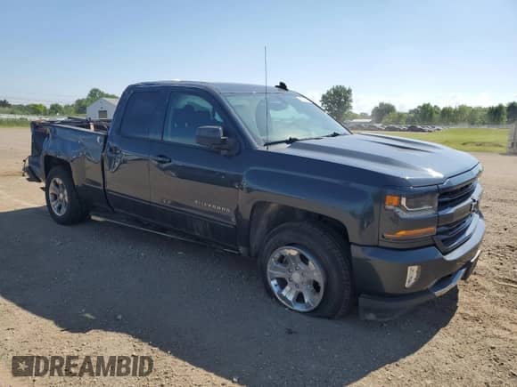 2017 Chevrolet Silverado 1500 LT with VIN 1GCVKREH5HZ194518, listed as a Copart auction lot 64559415 with 85,535 mi miles and Salvage title. Bid and sale history available at DreamBid. Image 4.