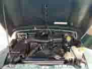 2000 Jeep Wrangler SE with VIN 1J4FA29P2YP800721, listed as a Copart auction lot 67490145 with 128,182 mi miles and Clean title. Bid and sale history available at DreamBid. Image 11.