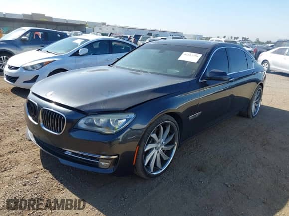 2013 BMW 7 Series 750Li xDrive with VIN WBAYF8C58DD141658, listed as a IAAI auction lot 42327776 with 130,428 mi miles and . Bid and sale history available at DreamBid. Image 17.