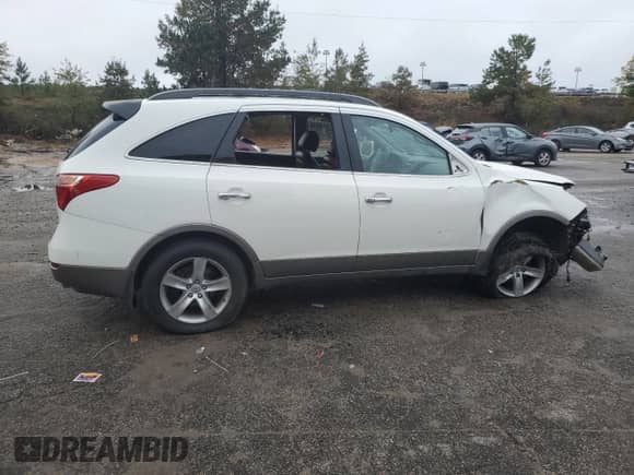 2011 Hyundai Veracruz GLS z VIN KM8NUDCC8BU166653, wystawiony jako Copart lot #79640244 z przebiegiem 243 389 mil mil oraz Szkoda całkowita • Salvage title. Historia ofert i sprzedaży dostępna na DreamBid. Obrazek 3.