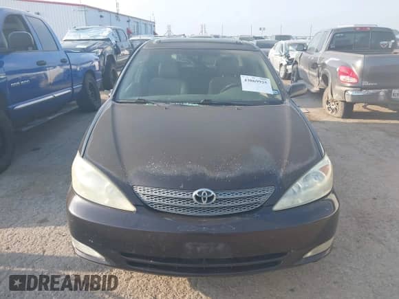 2004 Toyota Camry LE with VIN JTDBF32K440154756, listed as a IAAI auction lot 43069925 with 124,422 mi miles and . Bid and sale history available at DreamBid. Image 12.