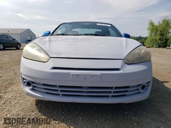 2007 Hyundai Tiburon GT с VIN KMHHN66F17U239526, выставлен на аукционе Copart как лот 64397625 с пробегом 136 807 миль миль и Списание • Salvage title. История ставок и продаж доступна на DreamBid. Изображение 5.