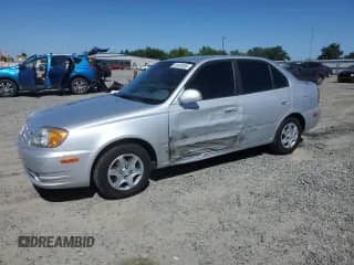 2005 Hyundai Accent GLS z VIN KMHCG45C55U634127, wystawiony jako Copart lot #58403695 z przebiegiem 132 411 mil mil oraz Szkoda całkowita • Salvage title. Historia ofert i sprzedaży dostępna na DreamBid. Obrazek 1.