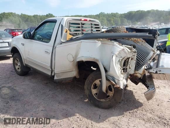 2000 Ford F-150 XL z VIN 1FTZF1828YNA84245, wystawiony jako IAAI lot #43340021 z przebiegiem Nie podano mil oraz . Historia ofert i sprzedaży dostępna na DreamBid. Obrazek 3.