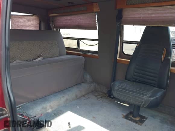 1999 Ford Econoline Cargo with VIN 1FDRE14W2XHC18025, listed as a IAAI auction lot 42421405 with 69,683 mi miles and . Bid and sale history available at DreamBid. Image 8.