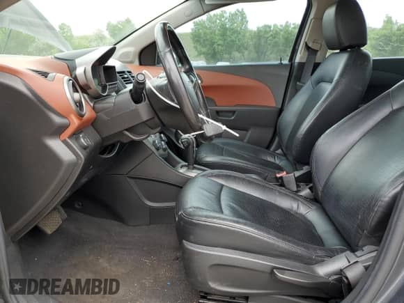 2013 Chevrolet Sonic LTZ с VIN 1G1JE5SH0D4102525, выставлен на аукционе Copart как лот 60976595 с пробегом 138 420 миль миль и Списание • Salvage title. История ставок и продаж доступна на DreamBid. Изображение 7.