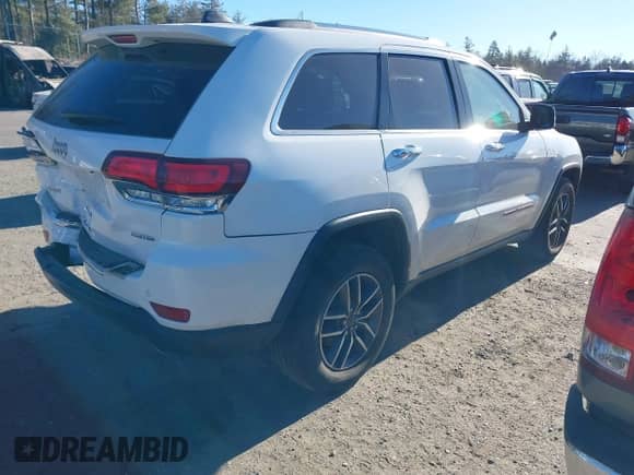 2021 Jeep Grand Cherokee 80th Anniversary with VIN 1C4RJFBG0MC730058, listed as a IAAI auction lot 41263939 with 34,659 mi miles and . Bid and sale history available at DreamBid. Image 4.