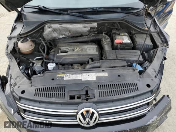 2013 Volkswagen Tiguan SE z VIN WVGAV3AX8DW059220, wystawiony jako Copart lot #49921455 z przebiegiem 138 666 mil mil oraz Szkoda całkowita • Salvage title. Historia ofert i sprzedaży dostępna na DreamBid. Obrazek 12.