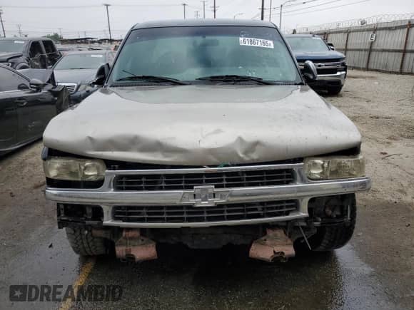 2000 Chevrolet Silverado 1500 LS z VIN 2GCEC19V5Y1395486, wystawiony jako Copart lot #61867165 z przebiegiem 156 882 mil mil oraz Czysty tytuł • Clean title. Historia ofert i sprzedaży dostępna na DreamBid. Obrazek 5.