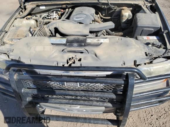 2001 Chevrolet Suburban LS z VIN 3GNEC16T81G219443, wystawiony jako Copart lot #77371104 z przebiegiem 162 801 mil mil oraz Czysty tytuł • Clean title. Historia ofert i sprzedaży dostępna na DreamBid. Obrazek 12.