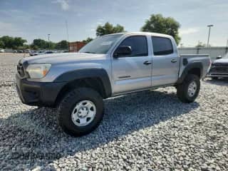 2014 Toyota Tacoma PreRunner with VIN 5TFJX4GN5EX036242, listed as a Copart auction lot 60286205 with 254,670 mi miles and Clean title. Bid and sale history available at DreamBid. Image 1.