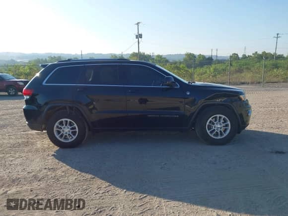 2020 Jeep Grand Cherokee Laredo E with VIN 1C4RJFAG8LC163503, listed as a IAAI auction lot 42948393 with 140,737 mi miles and . Bid and sale history available at DreamBid. Image 13.