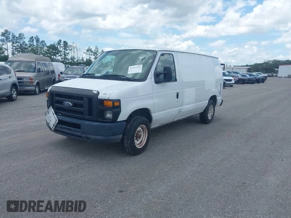 2010 Ford Econoline Cargo Commercial with VIN 1FTNE1EWXADA91492, listed as a IAAI auction lot 42707525 with 435,844 mi miles and . Bid and sale history available at DreamBid. Image 2.
