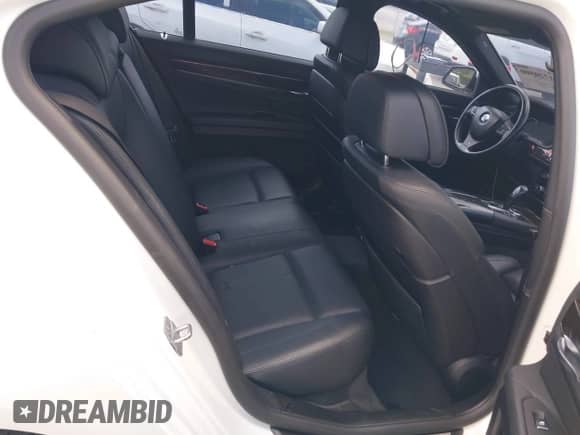 2014 BMW 7 Series 740i с VIN WBAYA6C53ED144195, выставлен на аукционе IAAI как лот 41720500 с пробегом 123 776 миль миль и . История ставок и продаж доступна на DreamBid. Изображение 8.
