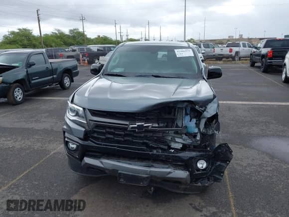 2022 Chevrolet Colorado 2WD Z71 z VIN 1GCGSDENXN1173627, wystawiony jako IAAI lot #42406970 z przebiegiem 21 937 mil mil oraz . Historia ofert i sprzedaży dostępna na DreamBid. Obrazek 11.