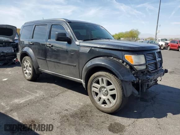 2011 Dodge Nitro Heat with VIN 1D4PT4GK6BW607981, listed as a Copart auction lot 69587695 with 160,495 mi miles and Salvage title. Bid and sale history available at DreamBid. Image 4.