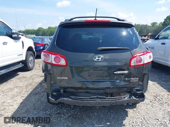 2010 Hyundai Santa Fe Limited z VIN 5NMSKDAG5AH339277, wystawiony jako IAAI lot #42561300 z przebiegiem 192 871 mil mil oraz . Historia ofert i sprzedaży dostępna na DreamBid. Obrazek 6.