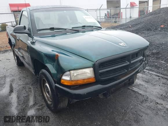 1999 Dodge Dakota SLT with VIN 1B7FL26XXXS209424, listed as a IAAI auction lot 41264544 with 70,523 mi miles and . Bid and sale history available at DreamBid. Image 1.