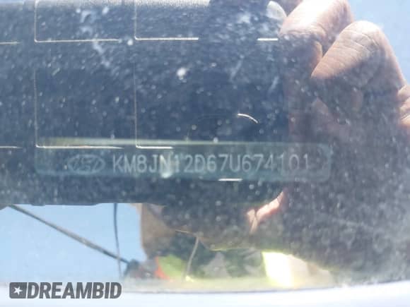 2007 Hyundai Tucson SE with VIN KM8JN12D67U674101, listed as a IAAI auction lot 43503952 with 197,306 mi miles and . Bid and sale history available at DreamBid. Image 12.