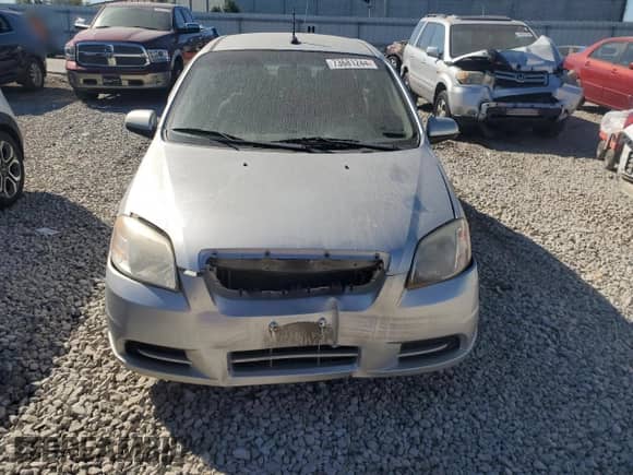 2011 Chevrolet Aveo 1LT with VIN KL1TD5DE4BB142595, listed as a Copart auction lot 73681244 with 142,436 mi miles and Salvage title. Bid and sale history available at DreamBid. Image 5.
