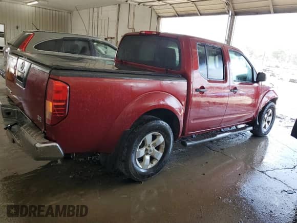 2010 Nissan Frontier SE with VIN 1N6AD0ER2AC432134, listed as a Copart auction lot 80090775 with 132,706 mi miles and Salvage title. Bid and sale history available at DreamBid. Image 3.