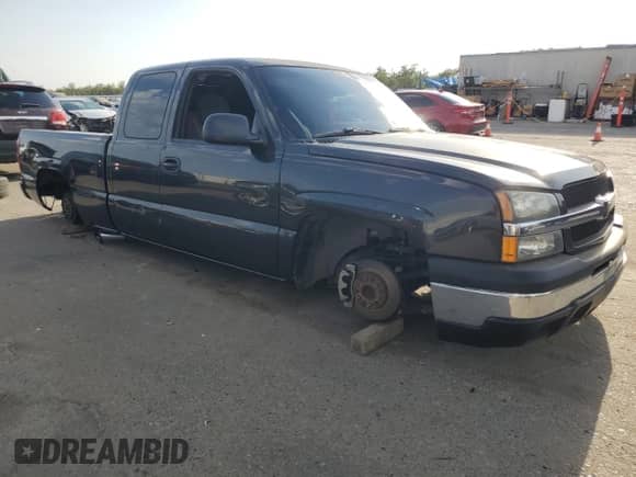 2005 Chevrolet Silverado 1500 Work Truck z VIN 1GCEC19V55Z327255, wystawiony jako Copart lot #71475115 z przebiegiem 211 799 mil mil oraz Szkoda całkowita • Salvage title. Historia ofert i sprzedaży dostępna na DreamBid. Obrazek 4.