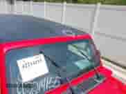 2022 Jeep Wrangler Unlimited Sahara с VIN 1C4JJXP65NW192508, выставлен на аукционе IAAI как лот 42214155 с пробегом 17 683 миль миль и . История ставок и продаж доступна на DreamBid. Изображение 17.