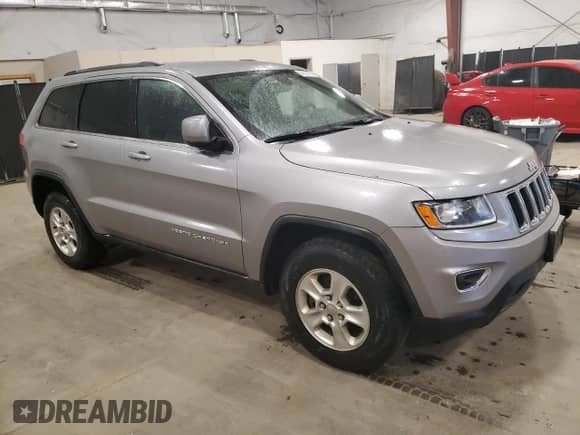 2016 Jeep Grand Cherokee Laredo with VIN 1C4RJFAG7GC420415, listed as a Copart auction lot 82528725 with 160,174 mi miles and Clean title. Bid and sale history available at DreamBid. Image 4.