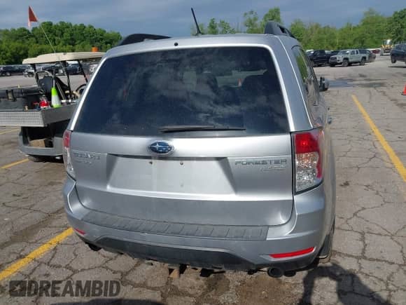 2012 Subaru Forester X Premium z VIN JF2SHADCXCG404478, wystawiony jako IAAI lot #42346705 z przebiegiem 185 665 mil mil oraz . Historia ofert i sprzedaży dostępna na DreamBid. Obrazek 16.