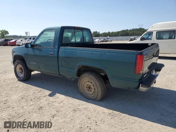 1998 GMC Sierra 1500 with VIN 1GTEK14W3WZ535896, listed as a Copart auction lot 63741625 with 130,831 mi miles and Salvage title. Bid and sale history available at DreamBid. Image 2.