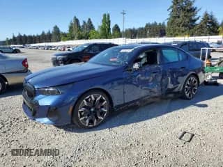 2025 BMW 5 Series с VIN WBA13FK06SCT74610, выставлен на аукционе Copart как лот 55362185 с пробегом Не указан миль и Списание • Salvage title. История ставок и продаж доступна на DreamBid. Изображение 1.