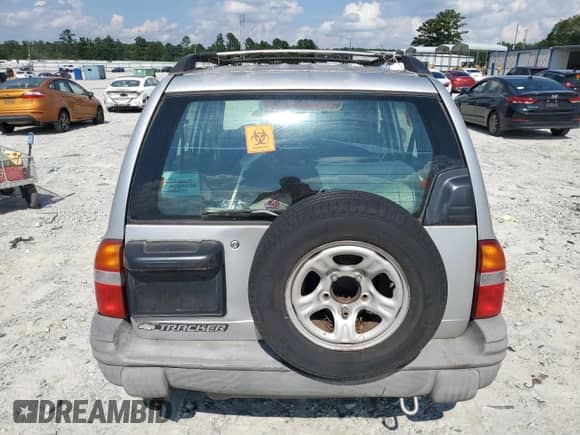2002 Chevrolet Tracker с VIN 2CNBE13C826912290, выставлен на аукционе Copart как лот 69659335 с пробегом 153 495 миль миль и Списание • Salvage title. История ставок и продаж доступна на DreamBid. Изображение 6.