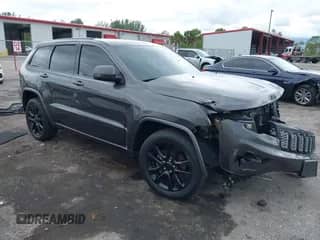 2018 Jeep Grand Cherokee Altitude with VIN 1C4RJEAG2JC428214, listed as a IAAI auction lot 42661661 with 81,859 mi miles and . Bid and sale history available at DreamBid. Image 1.