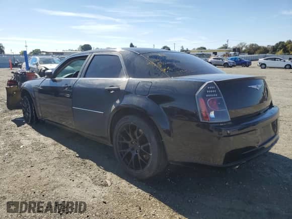 2007 Chrysler 300 C SRT-8 with VIN 2C3LA73W67H660170, listed as a Copart auction lot 87027115 with Not provided miles and Salvage title. Bid and sale history available at DreamBid. Image 2.