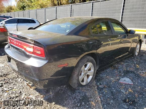 2012 Dodge Charger SE with VIN 2C3CDXBG0CH162588, listed as a Copart auction lot 82660735 with 188,409 mi miles and Clean title. Bid and sale history available at DreamBid. Image 3.