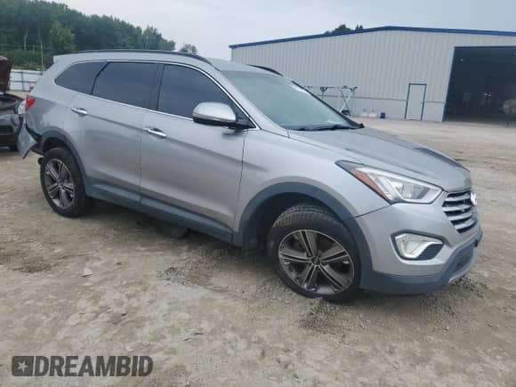2014 Hyundai Santa Fe Limited with VIN KM8SNDHF3EU079878, listed as a Copart auction lot 68010885 with 127,975 mi miles and Salvage title. Bid and sale history available at DreamBid. Image 4.