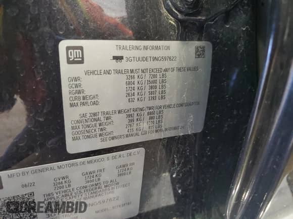 2022 GMC Sierra 1500 SLT with VIN 3GTUUDET9NG597622, listed as a Copart auction lot 50254235 with 64,864 mi miles and Salvage title. Bid and sale history available at DreamBid. Image 12.