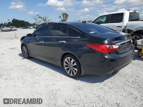 2013 Hyundai Sonata Limited с VIN 5NPEC4AC4DH810706, выставлен на аукционе Copart как лот 87311985 с пробегом 205 503 миль миль и Списание • Salvage title. История ставок и продаж доступна на DreamBid. Изображение 2.