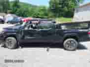 2021 Toyota Tacoma SR5 z VIN 3TYDZ5BN1MT002778, wystawiony jako IAAI lot #42591088 z przebiegiem Nie podano mil oraz . Historia ofert i sprzedaży dostępna na DreamBid. Obrazek 14.