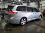 2012 Toyota Sienna with VIN 5TDZK3DC3CS240569, listed as a Copart auction lot 63664415 with 129,329 mi miles and Salvage title. Bid and sale history available at DreamBid. Image 3.