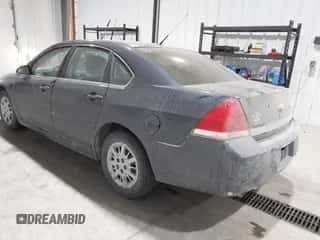 2011 Chevrolet Impala Police Police with VIN 2G1WD5EM2B1165829, listed as a IAAI auction lot 41380558 with 110,695 mi miles and . Bid and sale history available at DreamBid. Image 3.