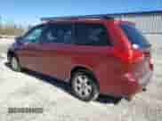 2010 Toyota Sienna LE z VIN 5TDKK4CC2AS309919, wystawiony jako Copart lot #82524135 z przebiegiem 196 955 mil mil oraz Szkoda całkowita • Salvage title. Historia ofert i sprzedaży dostępna na DreamBid. Obrazek 2.