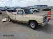 1987 Dodge Trucks with VIN 1B7HD14TXHS334781, listed as a Copart auction lot 69347244 with 69,244 mi miles and Salvage title. Bid and sale history available at DreamBid. Image 4.