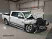 2014 Ram 1500 Longhorn z VIN 1C6RR7PT2ES176525, wystawiony jako IAAI lot #43267050 z przebiegiem 160 941 mil mil oraz . Historia ofert i sprzedaży dostępna na DreamBid. Obrazek 1.