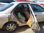 1997 Toyota Camry LE z VIN JT2BF22K5V0069221, wystawiony jako IAAI lot #43226716 z przebiegiem 173 501 mil mil oraz . Historia ofert i sprzedaży dostępna na DreamBid. Obrazek 8.